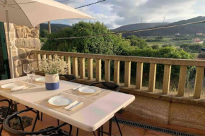 Casa rural con terraza, barbacoa y chimenea